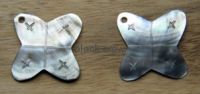 Carved blacklip shell hanger (2)
